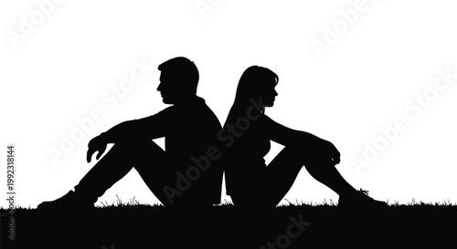 Silhouetted man and woman sitting back to back in silence experiencing a difficult moment in their relationship