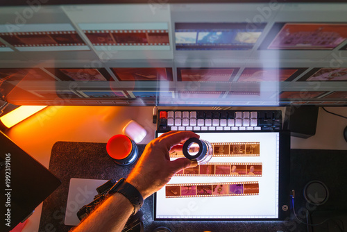 Photographer editing software monitor film strips light table workstation