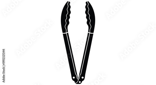 A stark black representation of kitchen tongs is isolated on a white background creating a striking silhouette high quality
