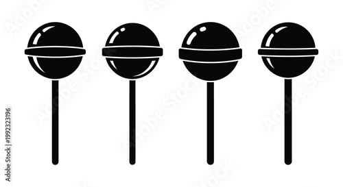 Four round lollipops lined up depicted in black silhouette