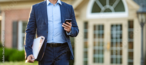 Property insurance promotion. Successful broker. American businessman with phone. Real estate agent at house for sale. Realtor chatting on phone. Rent or buy new home. Home insure, copy space