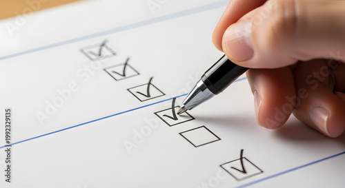 Workers marking boxes on a form during Labour Day, a close-up view of a hand holding a pen, checking off items on a piece of paper in an office setting with a sense of accomplishment.