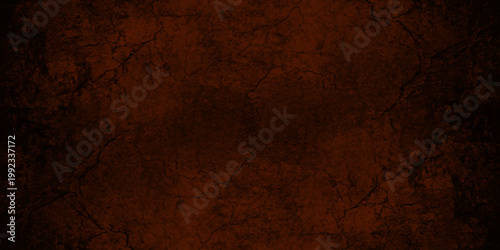 Dark reddish brown grunge texture background with cracked earth patterns and black vignette frame for spooky designs