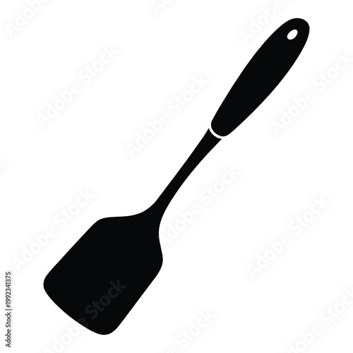 A simple black silhouette of a kitchen spatula angled diagonally against a white background silhouette