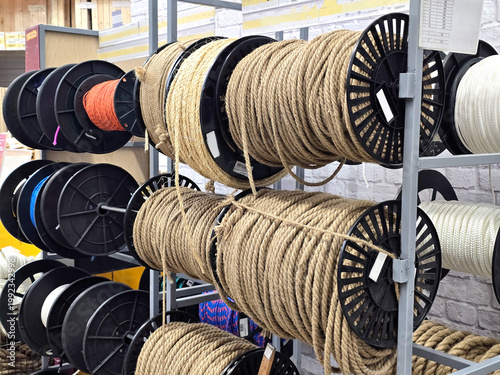 Jute rope on display in a store. The rope is wound onto a spool.