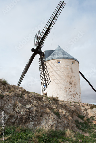 Historical windmill with wooden blades. Consuegra, Toledo, Spain
