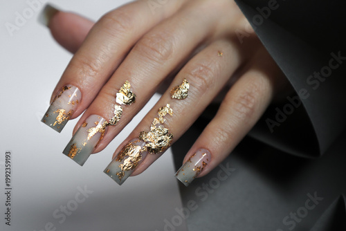 hand with golden manicure