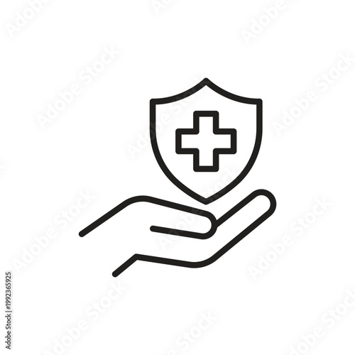 Hand holding medical shield icon for healthcare and protection