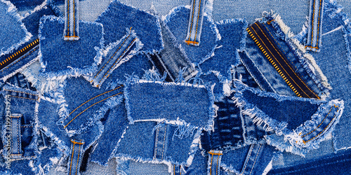фотографія Various pieces of denim fabric arranged together on a flat surface for crafting