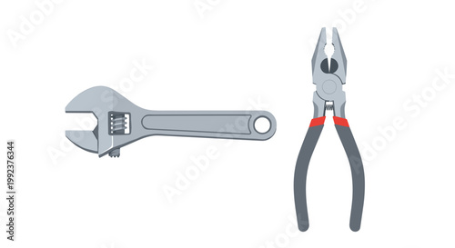 A set of essential hand tools including a silver adjustable wrench and a pair of steel pliers with ergonomic black and red grips are displayed clearly.
