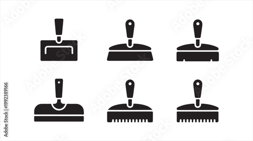 Hand tool symbols set showing filling and scraping knives for renovation and painting