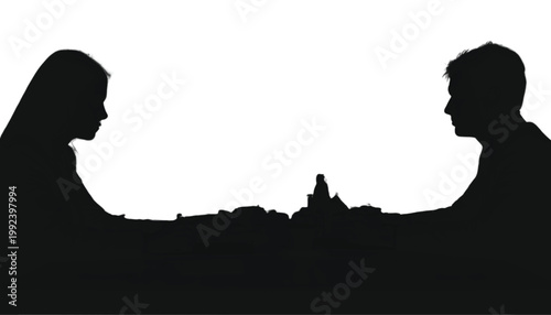 Colleagues sit at a table while observing a small city model during a strategic urban planning session.