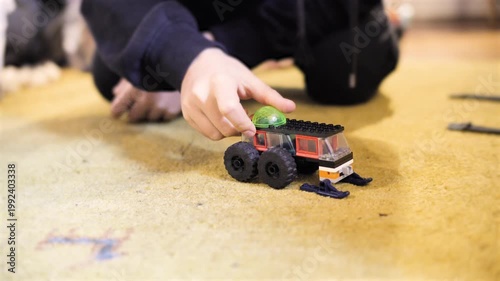 Kids play LEGO toy car jumps, snowplow, truck, drift. High quality 4k footage