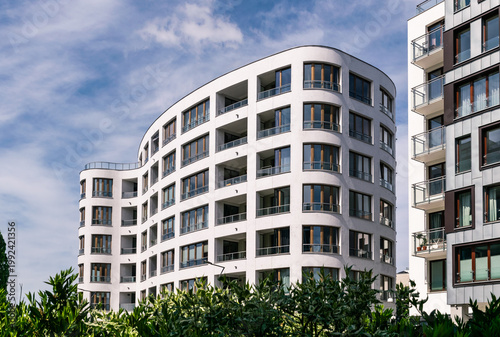 Beautiful new block house in the blooming garden. Housing development in Europe