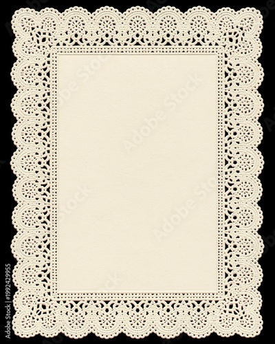 Vintage cream lace doily frame with blank paper center on black background, elegant decorative border with copy space for invitation, menu or greeting card design.