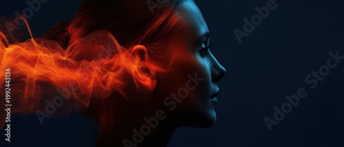 Orange light glows on womans ear at night