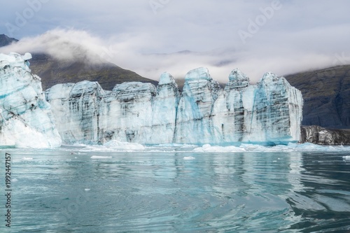 Jokulsarlon glacier on a sunny day, glacier lagoon. Vatnajokull National Park. Winter landscapes in Iceland, copy space banner. Travel landmark