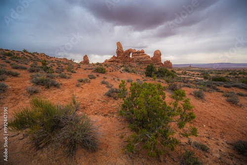 Dramatic and colorful landscape of Arches National Park Utah USA, turret arch on a moody cloudy day. nature and travel banner. copy space, tourism