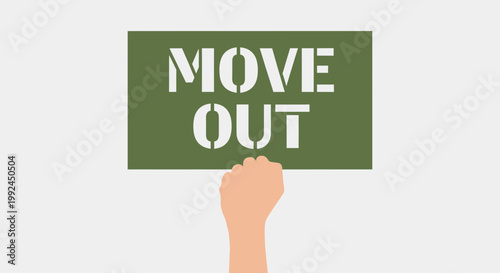 Hand Holding "MOVE OUT" Sign - Eviction or Relocation Concept