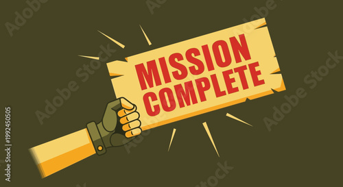 Hand holding "Mission Complete" sign, success, achievement, accomplishment, victory, goal reached