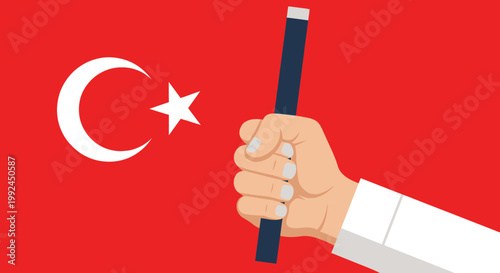 Hand holding pointer stick in front of Turkish flag, education concept