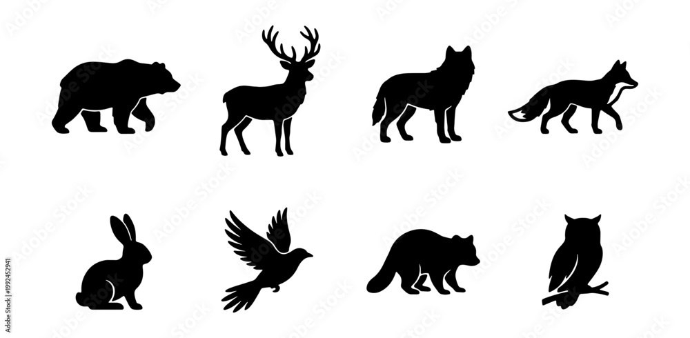 Obraz premium Set of wild forest animal silhouettes, including bear, deer, wolf, fox, rabbit, bird, raccoon, and owl