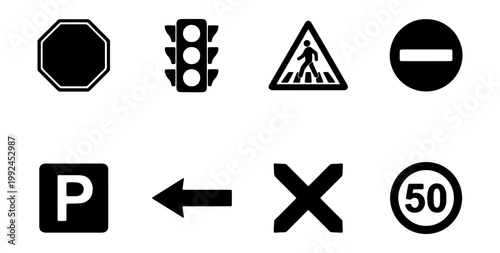 Set of various road traffic signs and symbols including stop, parking, pedestrian crossing, traffic light, speed limit, and no entry icons