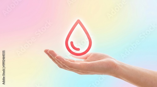 Single Red Drop Icon Floating Above Open Hand