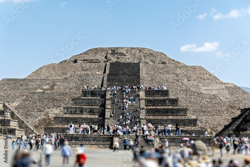 Visitors climb Pyramid of the Moon at Teotihuacan archaeological site in Mexico during sunny day