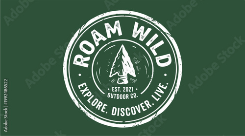 Roam Wild Outdoor Co Vintage Emblem with Arrow and Mountains.