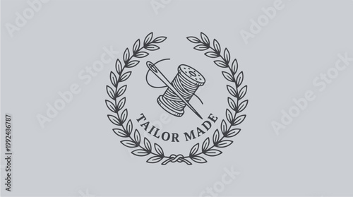 Tailor Made Emblem with Needle and Thread.