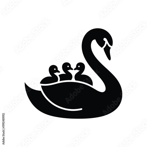 A black silhouette of a swan with three cygnets swimming closely together