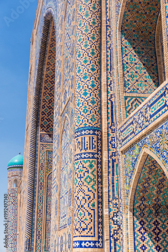 Detail of the stunningly beautiful exterior of the Tilya-Kori Mosque in historic Samarkand