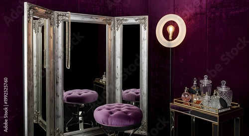 Luxurious Dressing Room With Ornate Mirror Frame And Plush Purple Stools Illuminated By A Modern Wall Lamp