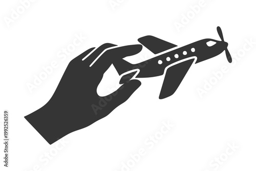 おもちゃの飛行機を持つ手のシルエットアイコン