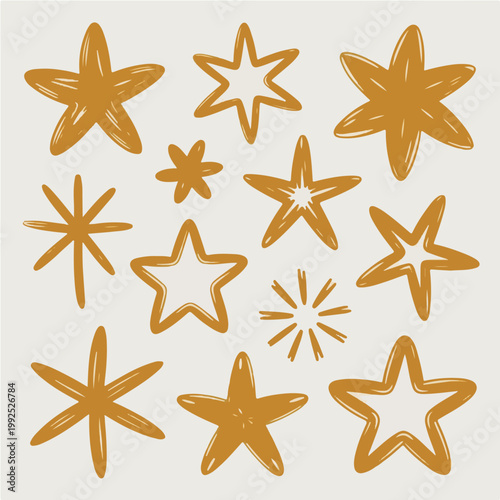 Set of hand drawn gold star doodles, organic yellow sparkle and twinkle icons isolated on light gray background