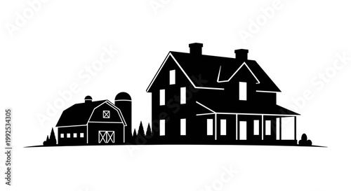 Large house with a barn nearby.