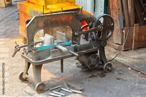 Old, electric hacksaw machine