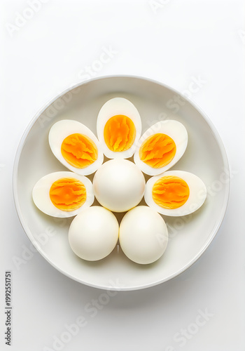 Halved boiled eggs on a plate
