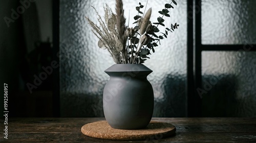 Elegant Minimalist Vase with Dried Flowers on Wooden Surface