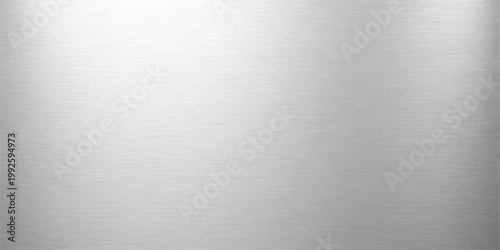 Brushed silver metal texture background with a shiny stainless steel surface and smooth industrial pattern suitable for modern wallpaper backdrop