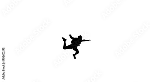 a black silhouette of a person jumping.