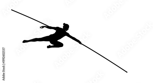 Athlete in mid air pole vaulting.