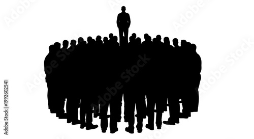Silhouette of a group of people standing together.