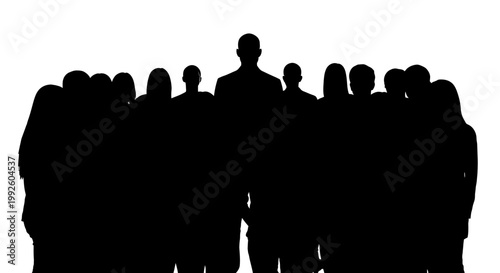 Silhouette of a group of people standing together.