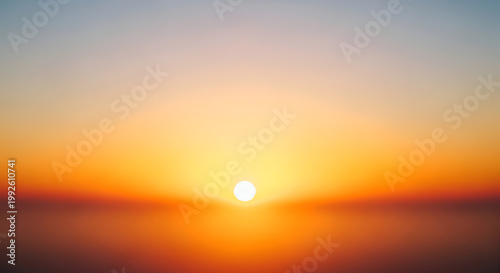 Vibrant sunset over serene ocean waters.