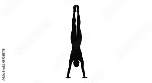Gymnast performs a perfect handstand in a black silhouette pose isolated on a stark white background.