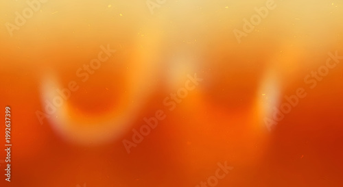 Blurry orange background with lights.