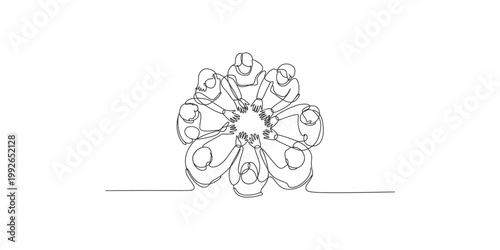 A group of people putting their hands together in a circle as a symbol of teamwork and unity on white background