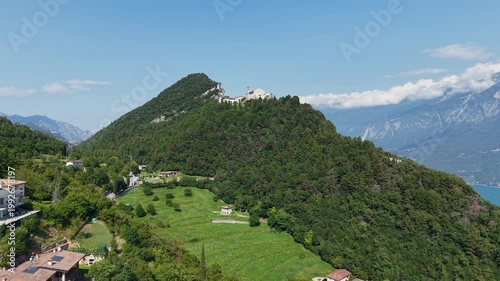 Italian beauty: Montecastello Sanctuary suspended over Lake Garda, professional aerial drone footage.